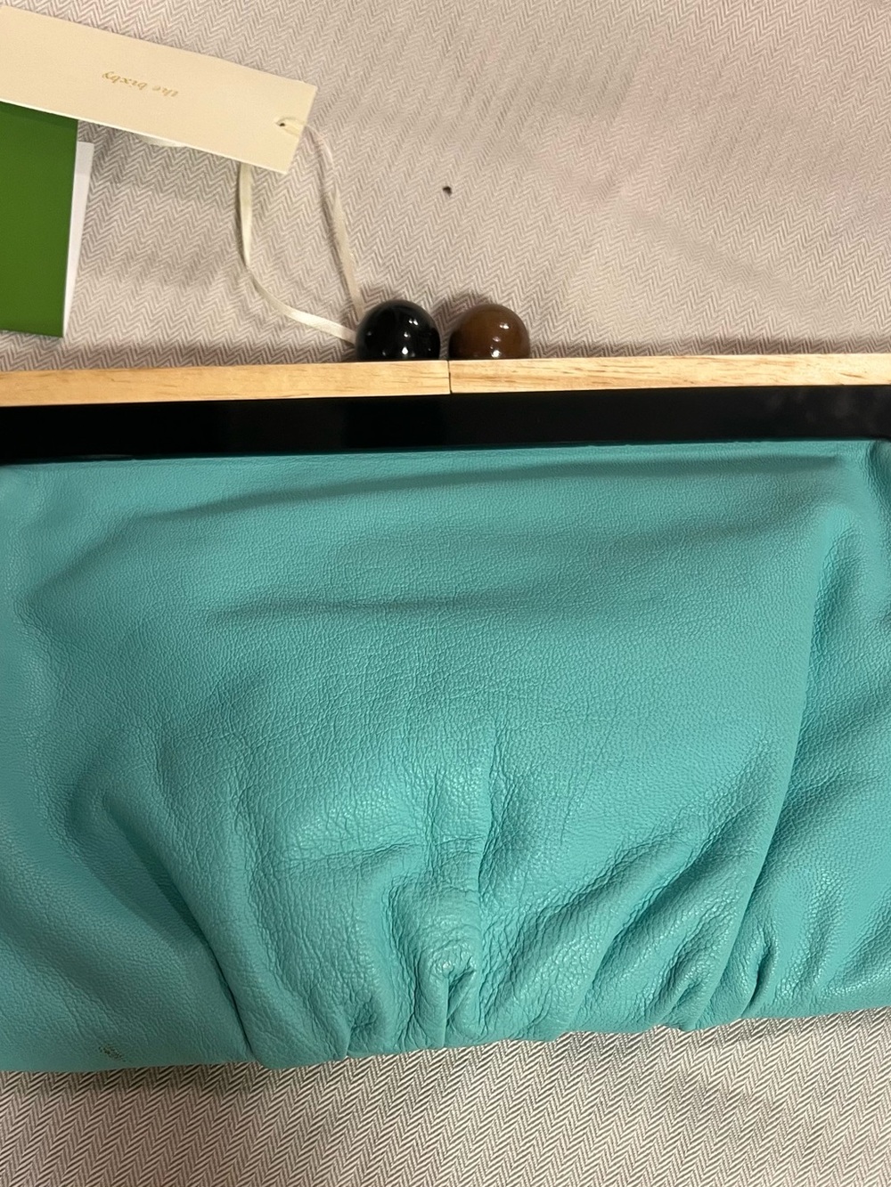 kate spade turquoise leather wristlet with gold plaque